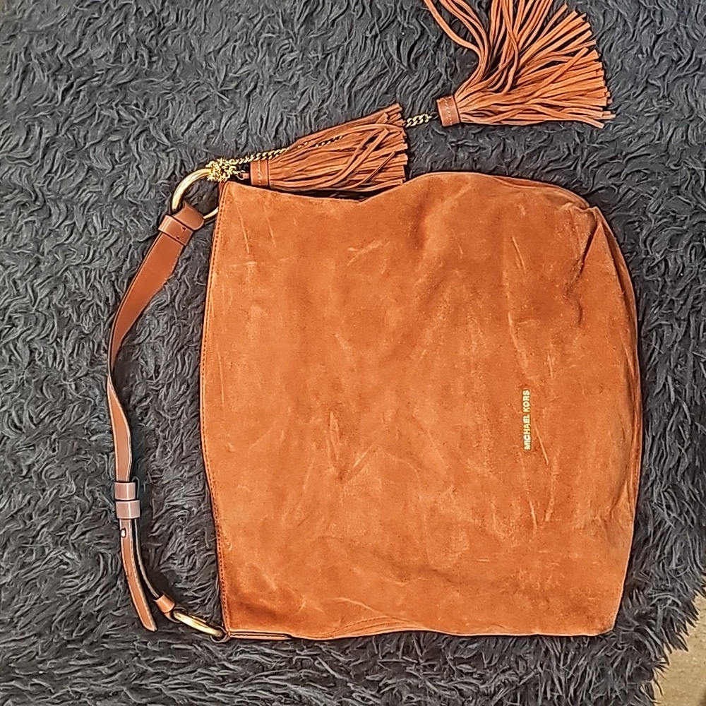 Michael Kors large satchel bag,burnt orange or peach color suede material.